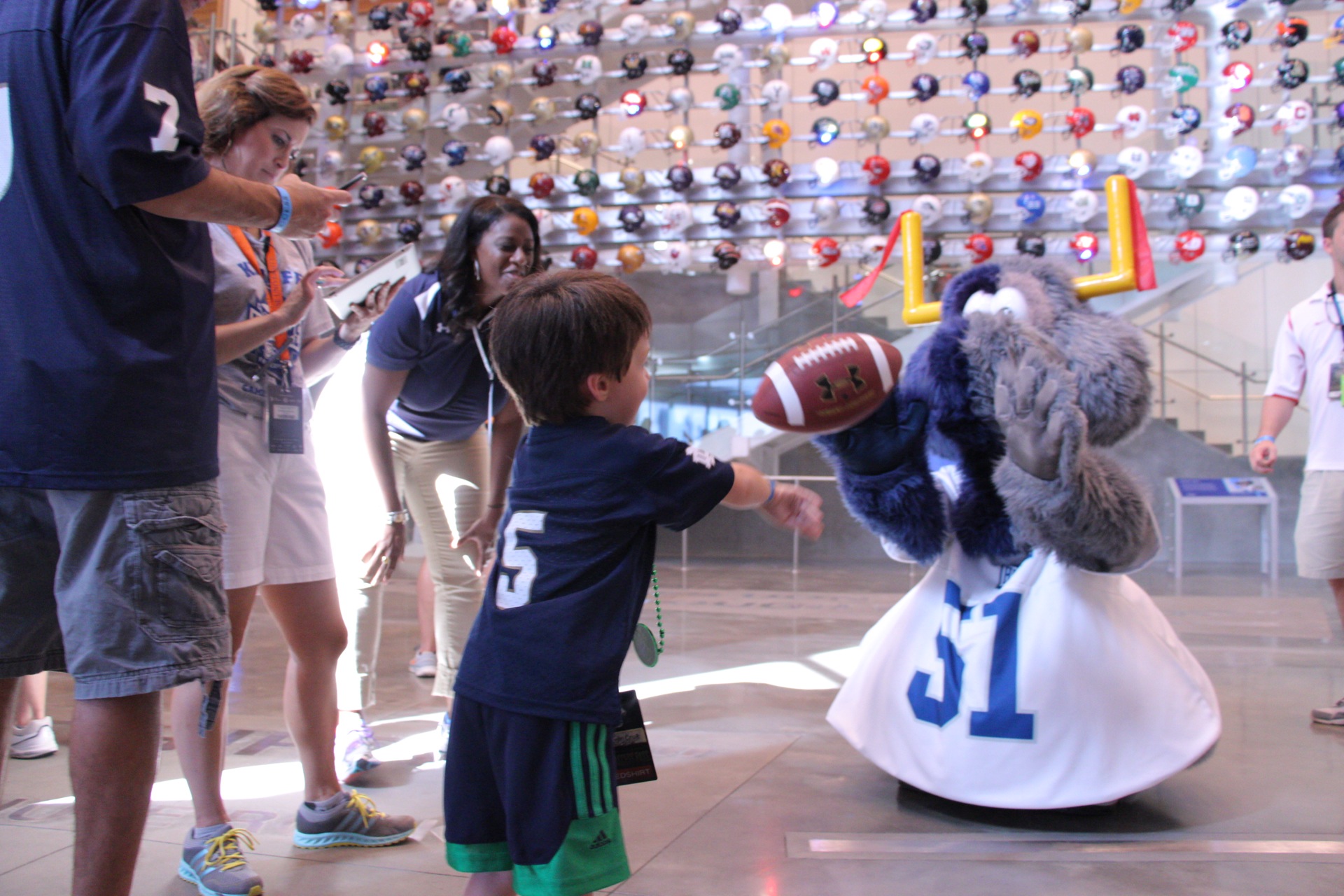 Fumbles Plays Catch With Young Fan